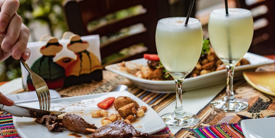 Peruvian food with the cocktail pisco sour.jpg