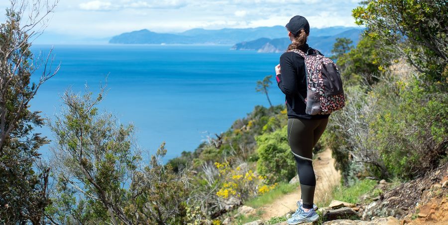hiker-overlooking-coastal-trail-italy.jpg