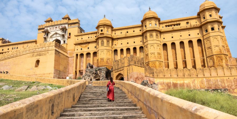 amber-fort-jaipur-rajasthan-india-woman-red-saree-staircase.jpg