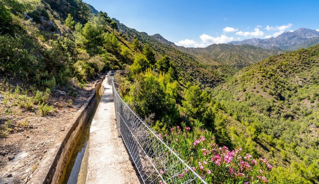 Take a scenic walk along the historic Acequias.