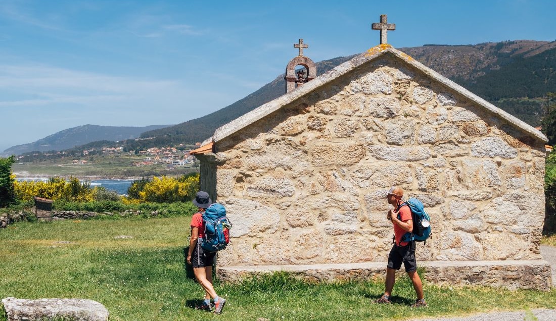Pass by ancient chapels on the Camino Portuguese Way.