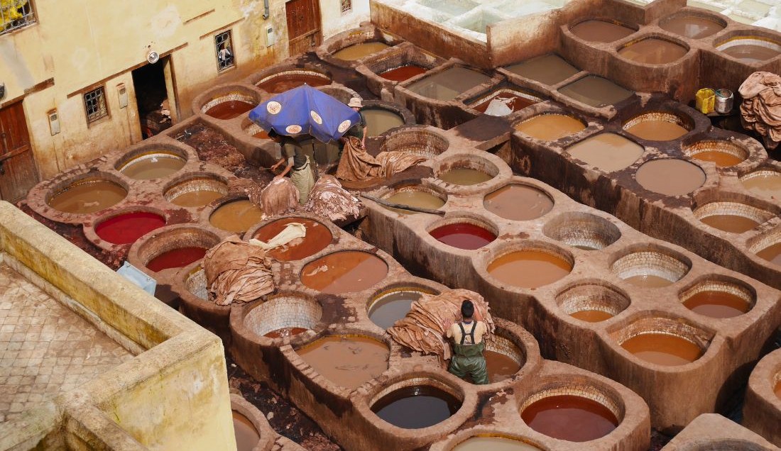 See centuries-old leather dyeing at a tannery in Fez.