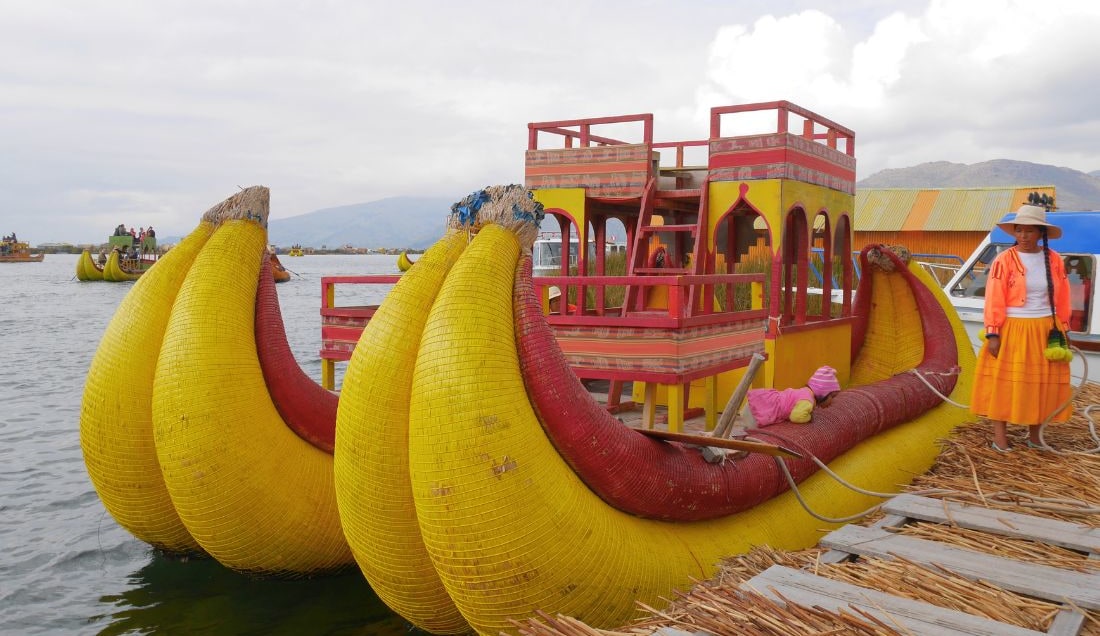 See traditional reed boats built by hand on Lake Titicaca.