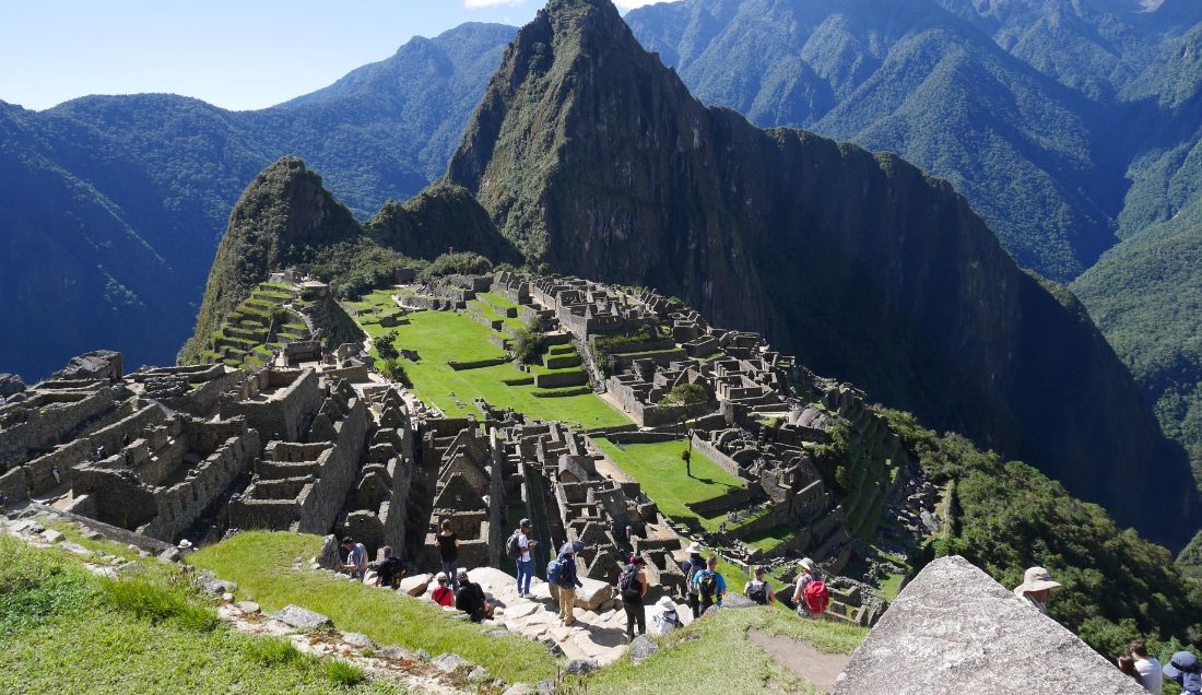 Explore the ancient ruins of Machu Picchu.