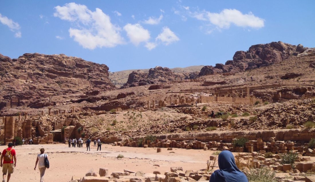Explore the ancient city of Petra, carved into the rock.